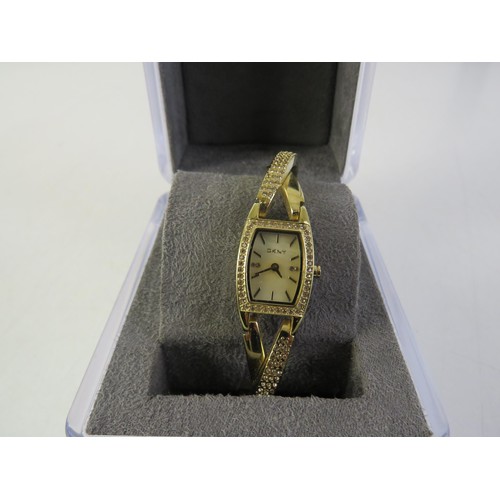28 - Boxed DKNY ladies watch with mother of pearl face