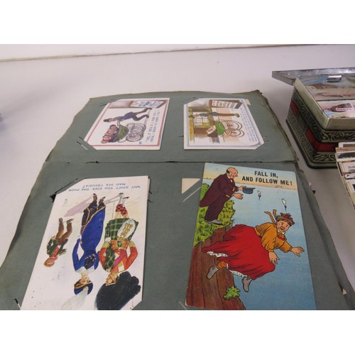 32 - Album and a tin full of assorted postcards