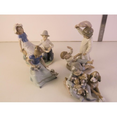 33 - Four assorted nao and lladro figures