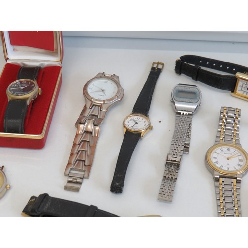 6 - Ten assorted watches and a watch head to include digital, timex, prestige etc