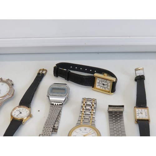 6 - Ten assorted watches and a watch head to include digital, timex, prestige etc