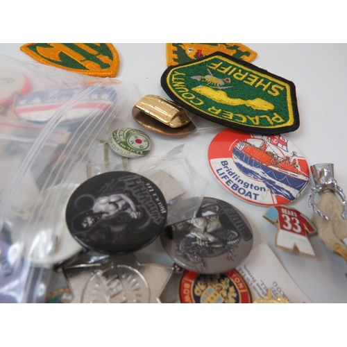 27 - Approximately 100 Brooches, badges and patches