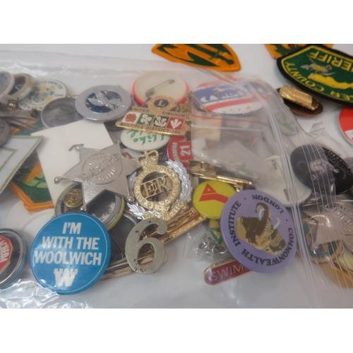 27 - Approximately 100 Brooches, badges and patches