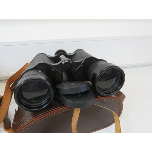 296 - Two pairs of binoculars with cases, Vespa Superfield 12x50 Field and Frank Nipole 10x50 Field, both ... 