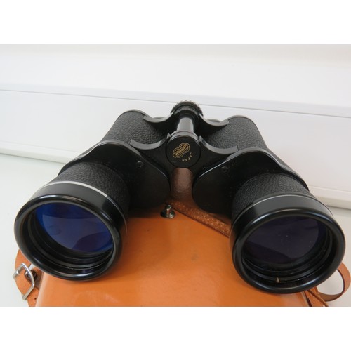 296 - Two pairs of binoculars with cases, Vespa Superfield 12x50 Field and Frank Nipole 10x50 Field, both ... 
