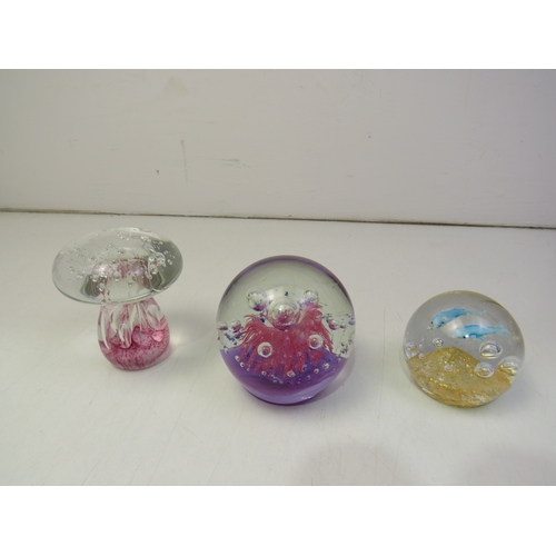 157 - Three glass paperweights