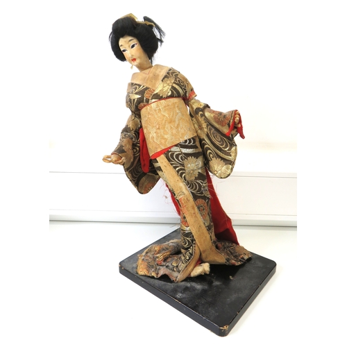 63 - Three large vintage Japanese Geisha/Komachi dolls with silk Kimonos on wooden stands.