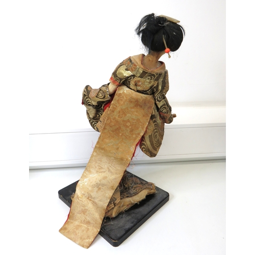 63 - Three large vintage Japanese Geisha/Komachi dolls with silk Kimonos on wooden stands.