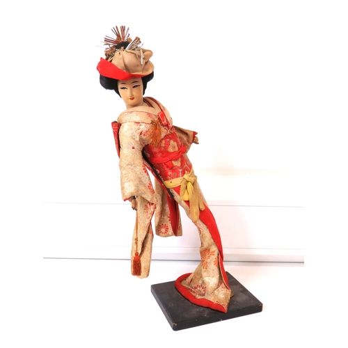 63 - Three large vintage Japanese Geisha/Komachi dolls with silk Kimonos on wooden stands.