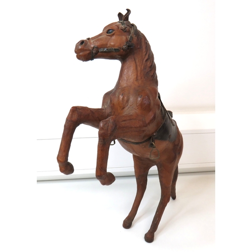 65 - Vintage leather wrapped rearing stallion horse figure.
