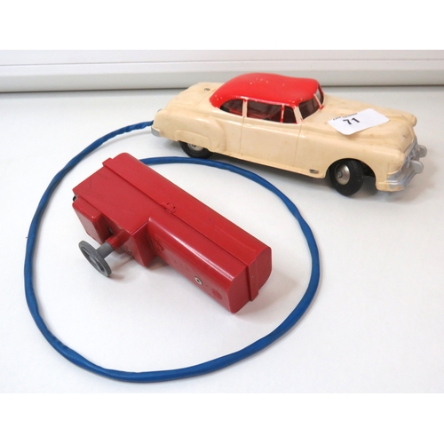 71 - Vintage 1960s Marx Toys battery operated remote control car with steering wheel control box.