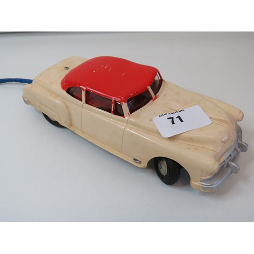 71 - Vintage 1960s Marx Toys battery operated remote control car with steering wheel control box.