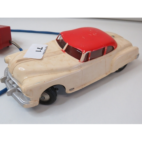 71 - Vintage 1960s Marx Toys battery operated remote control car with steering wheel control box.