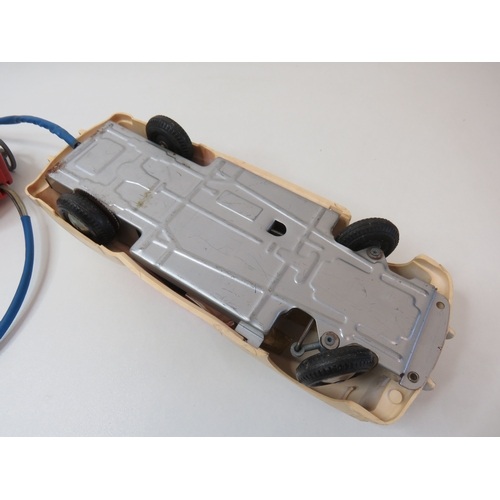 71 - Vintage 1960s Marx Toys battery operated remote control car with steering wheel control box.