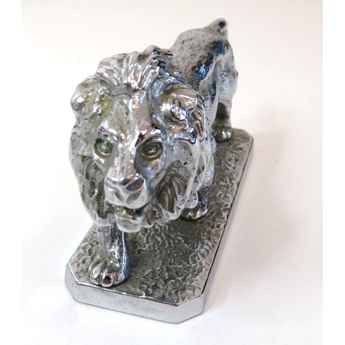 82 - Vintage heavy silver coloured lion figurine.