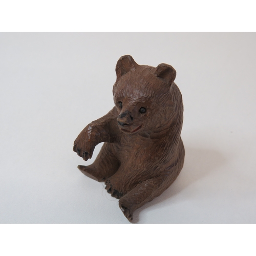 92 - Assorted collectables including carved Black Forest bear, soapstone scarab beetle, vintage Railway a... 