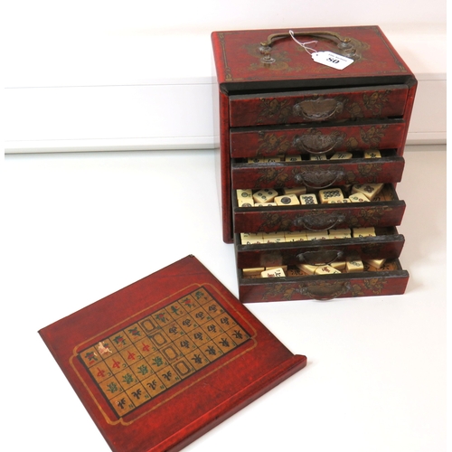 80 - Antique Chinese Mahjong set multi drawer wooden cabinet with bone and bamboo tiles.