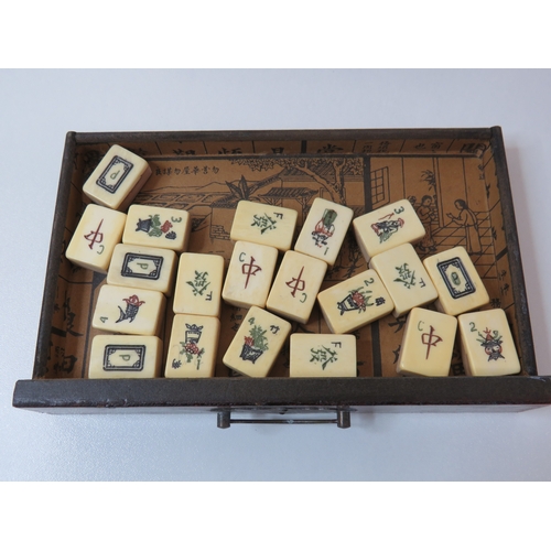 80 - Antique Chinese Mahjong set multi drawer wooden cabinet with bone and bamboo tiles.