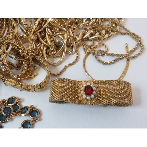 77 - 2kg of gold tone costume jewellery.