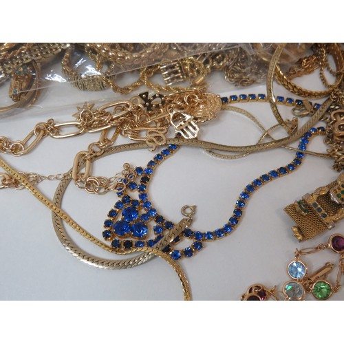 77 - 2kg of gold tone costume jewellery.