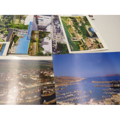 206 - Over 100 assorted postcards