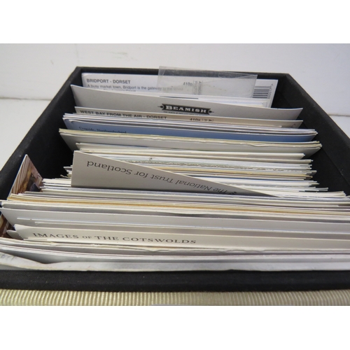 206 - Over 100 assorted postcards