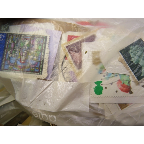 209 - 100's of old stamps in envelopes