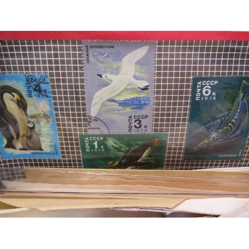 209 - 100's of old stamps in envelopes