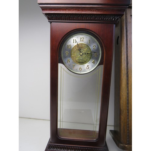 179 - Two longcase wall clocks