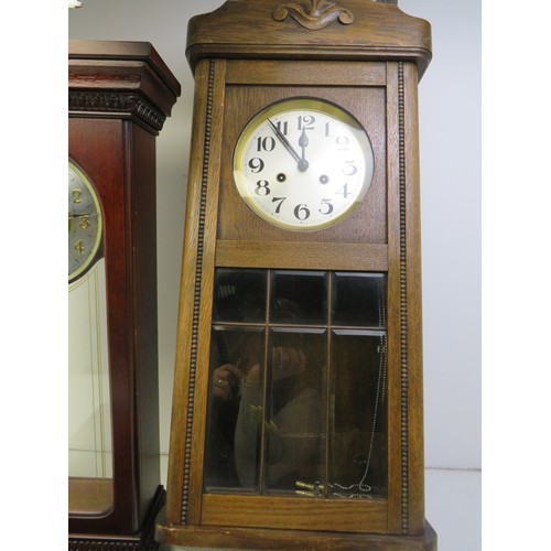 179 - Two longcase wall clocks