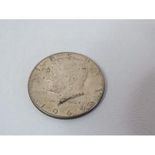 52 - Two USA silver Half Dollar coins 40% silver.