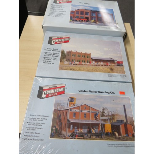 25 - Three Walthers cornerstone series model buildings to include car shop, Golden Valley Canning Co. and... 