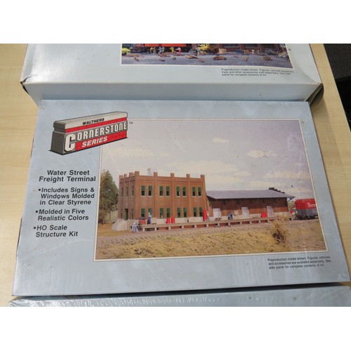 25 - Three Walthers cornerstone series model buildings to include car shop, Golden Valley Canning Co. and... 