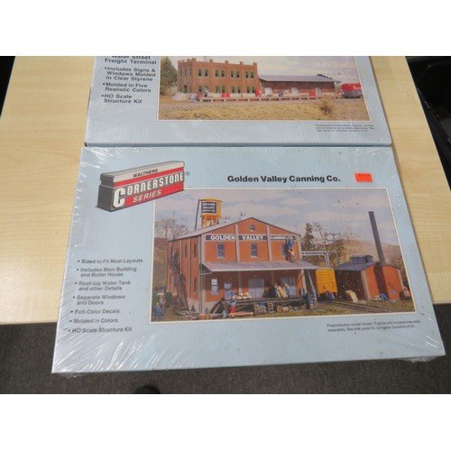 25 - Three Walthers cornerstone series model buildings to include car shop, Golden Valley Canning Co. and... 