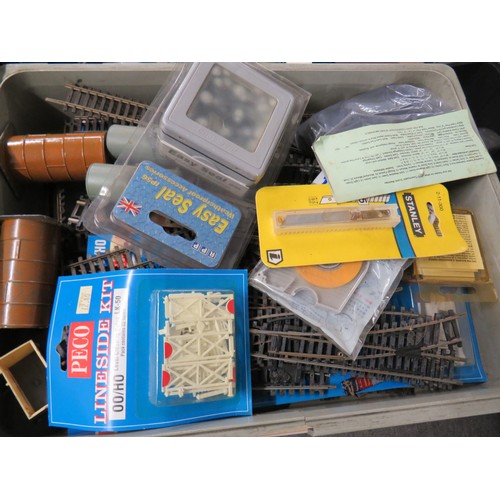 28 - Job lot of model railway items to include trains, trackside vehicles, track etc