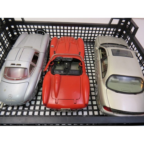 39 - Seven model cars to include Revell, Maisto and Burago