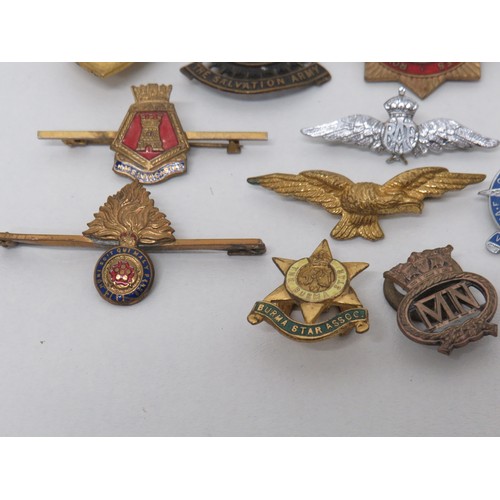 Lot of assorted badges including military