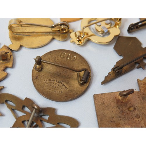 Fifteen assorted pin badges including military