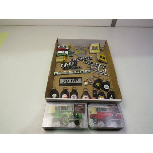 104 - Automobilia lot- cars, badges, keyrings, logos and tins