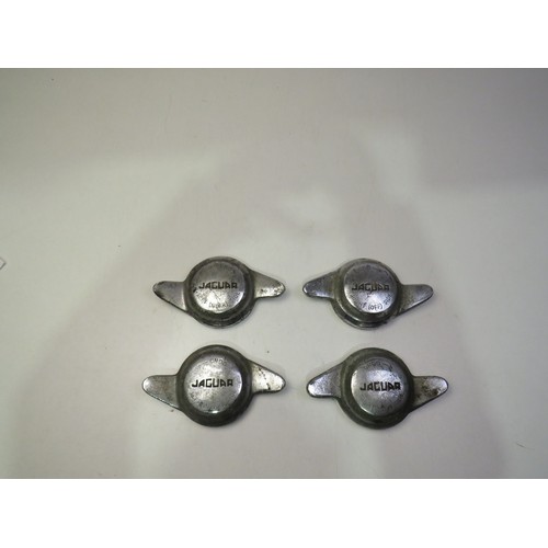 106 - Set of four Jaguar car wheel nuts