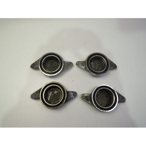 106 - Set of four Jaguar car wheel nuts
