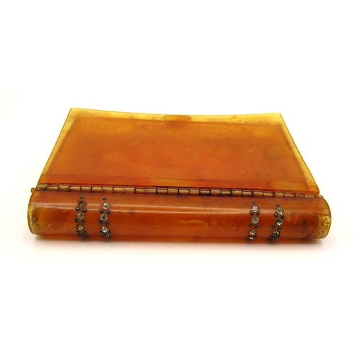 61B - Art Deco amber celluloid card case in the style of a book.