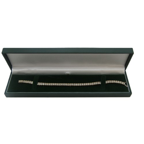 75B - A 9ct yellow gold tennis bracelet set with 2ct of Princess cut square Diamonds.
Weight 14.8g
Length ... 