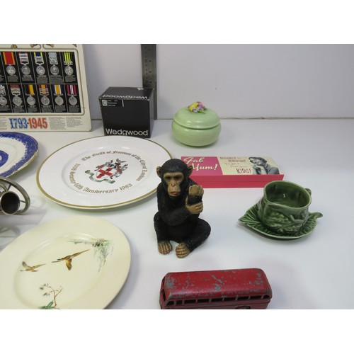 146 - Mixed box of collectables including Sylvac, Wedgwood, Royal Doulton, vintage buses, and more.