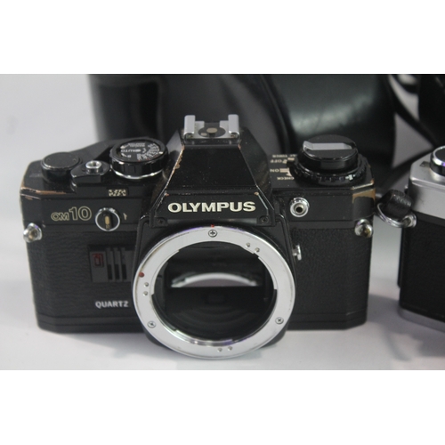 28 - Olympus SLR Film Cameras Working Inc OM-1N & OM10 Etc Bodies Only x 3