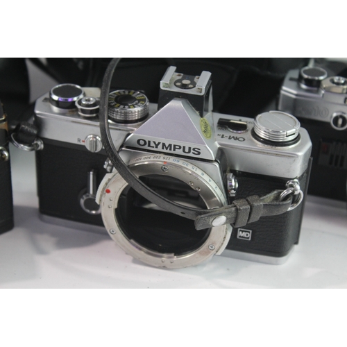 28 - Olympus SLR Film Cameras Working Inc OM-1N & OM10 Etc Bodies Only x 3