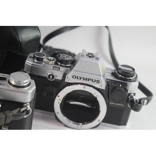 28 - Olympus SLR Film Cameras Working Inc OM-1N & OM10 Etc Bodies Only x 3