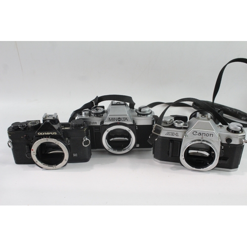 30 - SLR Film Cameras Working Inc Olympus, Canon & Minolta Etc Bodies Only x 3