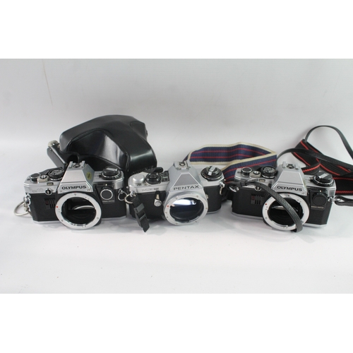 40 - SLR Film Cameras Working Inc Olympus & Pentax Etc Bodies Only x 3