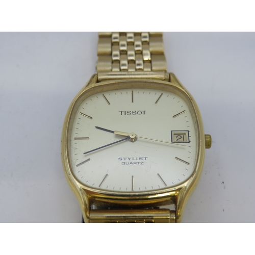 131 - Gold tone Tissot stylist watch